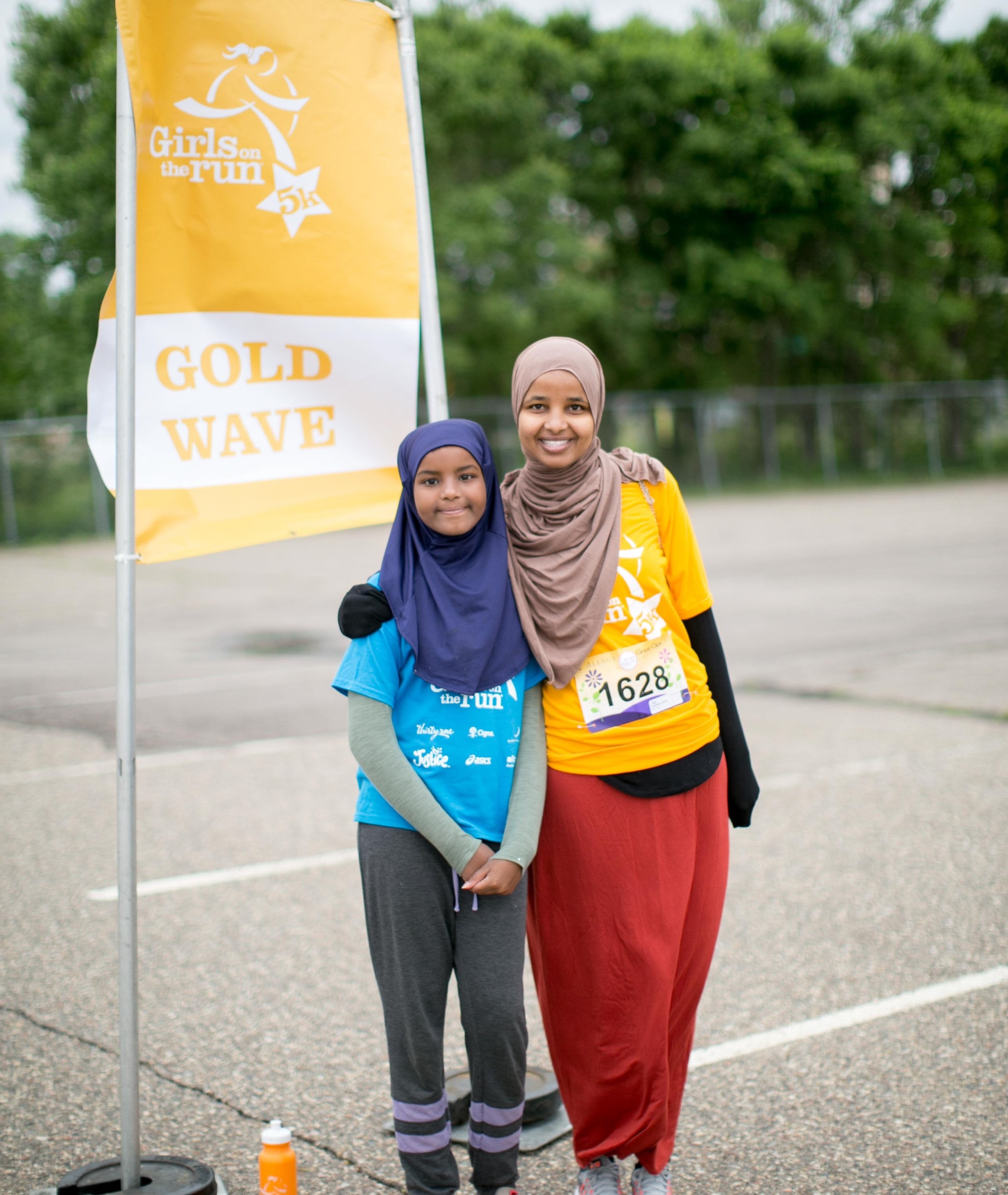 Girls on the run program participant smiles with 5K participant