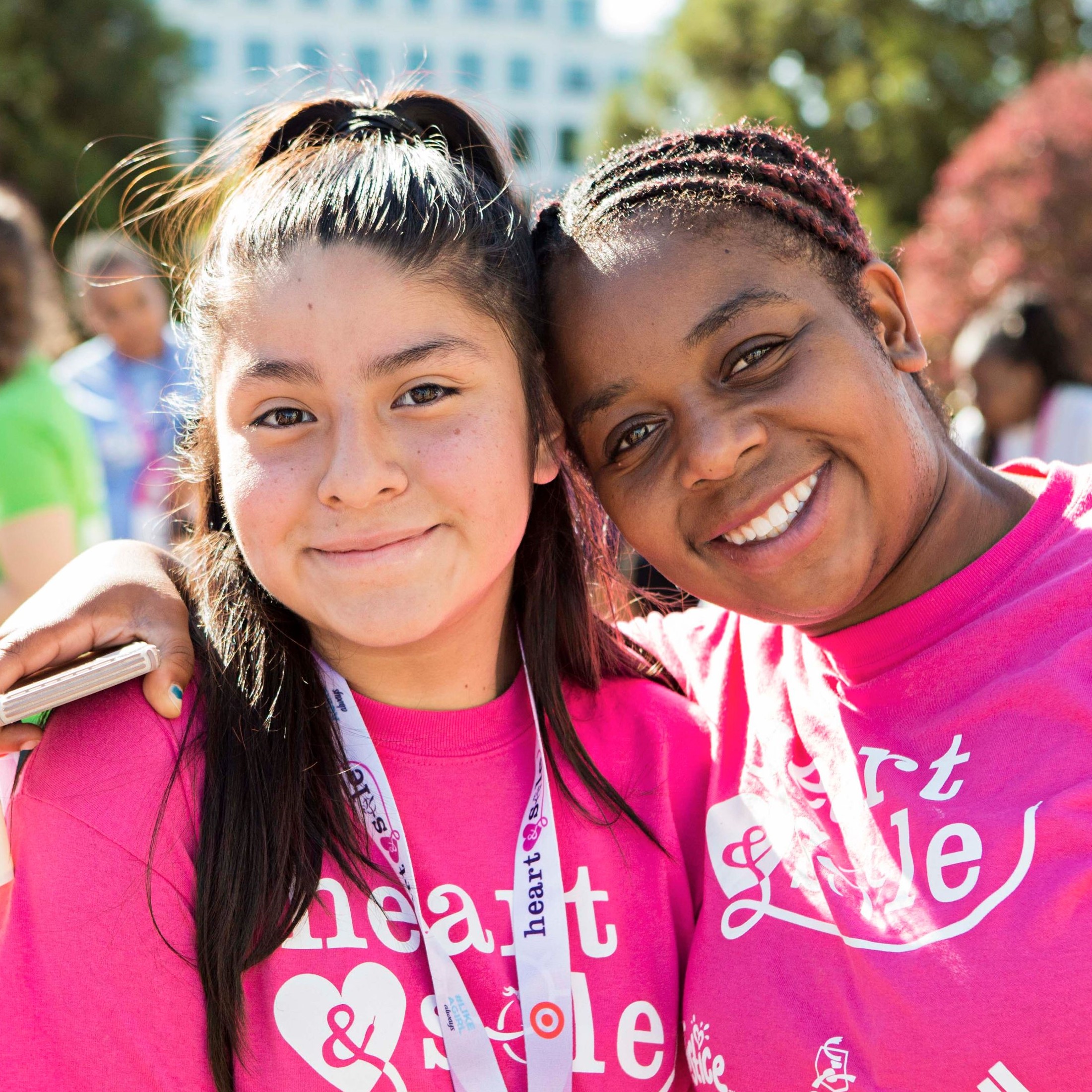 Two Girls on the Run participants smiling at 5k