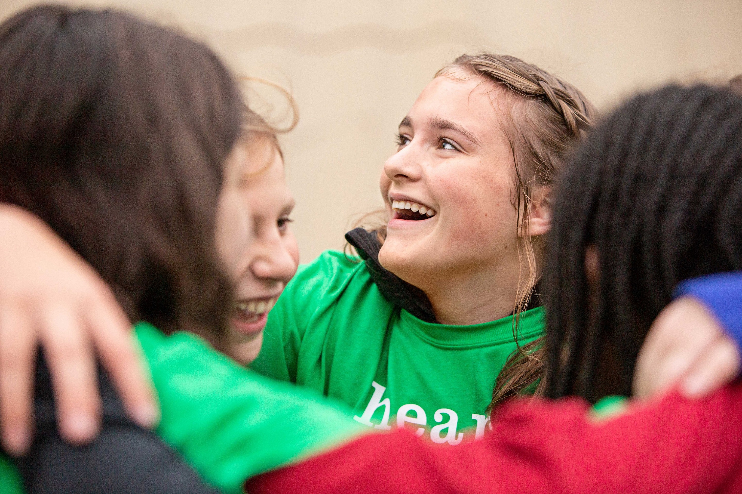 Two Girls on the Run participant both smile with an arm around each other
